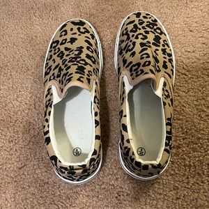 Animal print slide on shoes. Size 9. Brand new